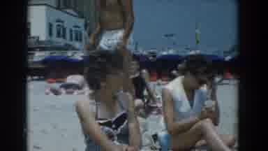 Yorktown Virginia (1958): Man In Polka Dot Bathing Suit Walks Down The Busy Beach
