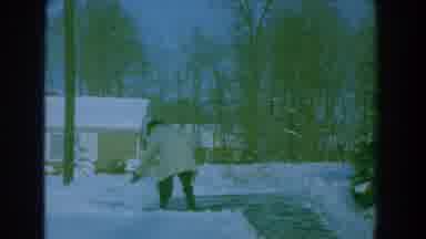 Florida (1959): Man Shovels Snow Off Pavement In Residential Neighborhood Houses