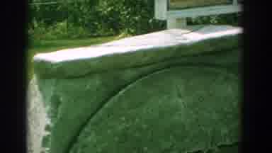 Florida (1959): A Rock Monument With A Sign Showing Two Pictures And A Tree In The