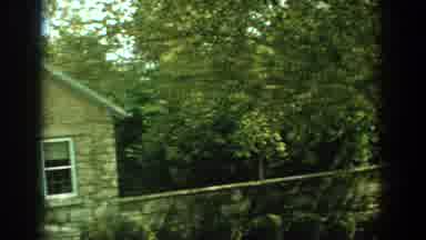 Florida (1959): View Of Green Trees And Tan Stone Buildings On A Clear Day