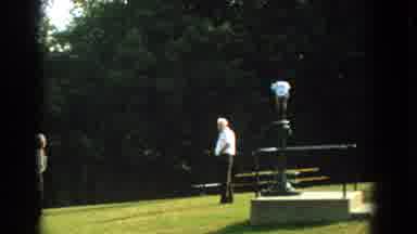 Florida (1959): Two Men Meeting And Talking At A Fountain In A Park