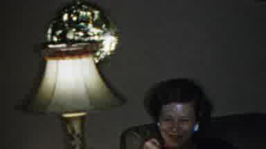 Paramus New Jersey (1959): Two Women Sitting On A Couch Next To A Lamp Something
