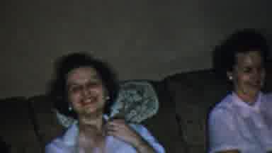 Paramus New Jersey (1959): Three Women Sitting On A Brown Sofa Laughing And