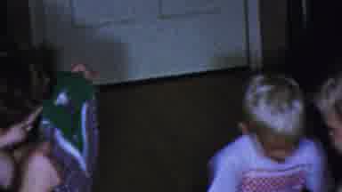 Paramus New Jersey (1959): Young Boy Opening Presents But Seems Pretty