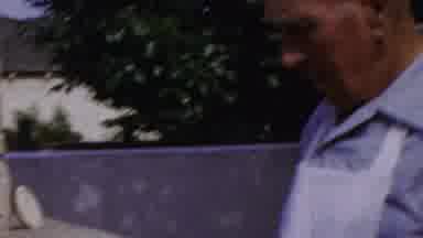 Paramus New Jersey (1959): Middle Aged Man Tries To Work An Outdoor Grill Sometime