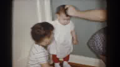 Bel Air Maryland (1960): Toddler Standing Near A Wall Then On An Adults Lap
