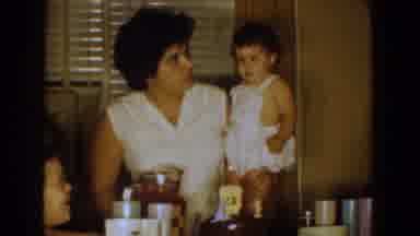 Bel Air Maryland (1960): Woman Wearing White Shirt Holds Baby Wearing White