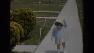 Bel Air Maryland (1960): Happy Child Walking Wearing Blue Dress Little Hat Across