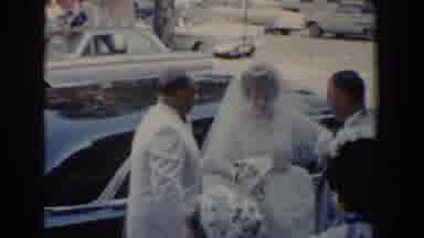 Bel Air Maryland (1960): A Man And A Woman Stepping Out Of A Car In All White