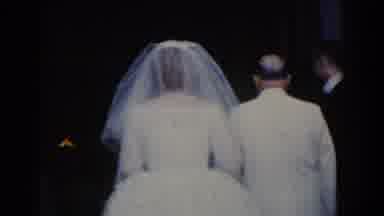 Bel Air Maryland (1960): Woman In A Wedding Dress Holds A Man Arm In Arm Followed