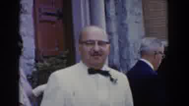 Bel Air Maryland (1960): Man Next To A Woman Waving At The Camera In Marriage