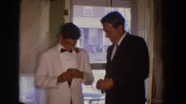 Bel Air Maryland (1960): Two Men Wearing Black White Suits Pose Near Window In