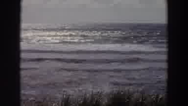 California (1964): Camera Pans From Left To Right Showing Ocean Waves Gently Roll