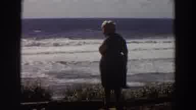 California (1964): Seems Like A Elderly Lady Enjoying Ocean Scenic View
