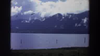 California (1964): View Of Mountains Green Trees And Clouds On A Clear Day