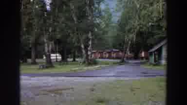 California (1964): Panning View Of Camp Buildings And Trees