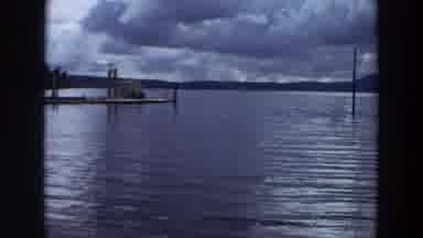 California (1964): Dark Clouds Stormy Weather Disrupts Lake Water In Front Of