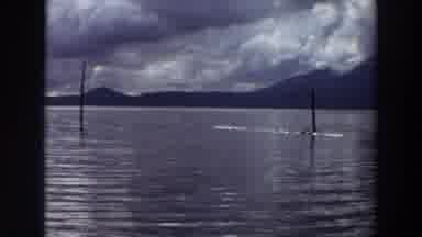California (1964): View Of Calm Lake Water Mountain And Clouds On A Sunny Day