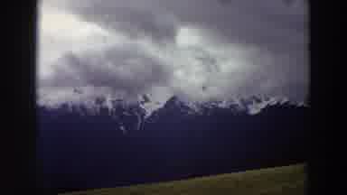 Washington (1964): View Of Mountains Shrouded By Clouds On A Clear Day
