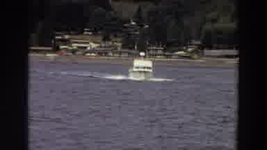 Washington (1964): A Motorboat Powers Through A Strong Cross Current Near A Shore