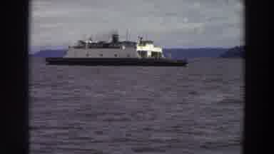 Washington (1964): A Ferry With Smoke Coming From Its Funnel Powers Through A