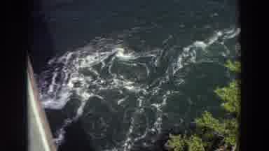 Washington (1964): River Flowing Under A Bridge With Whitecaps And Fast Current