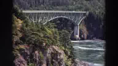 Washington (1964): Sturdy Bridge Over Moving Water Provides Connection Enabling