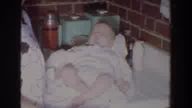 Fallston Maryland (1965): Mother Feeding And Providing Care For Her Young Baby On