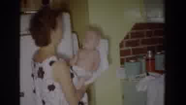 Fallston Maryland (1965): Mother And Grandmother Prepare Baby For A Bath