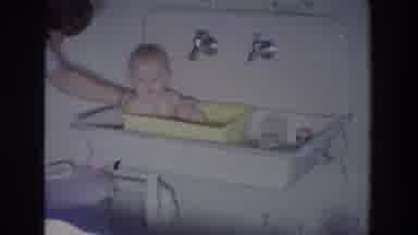 Fallston Maryland (1965): Mother Washes The Baby In A Yellow Basin In The Large