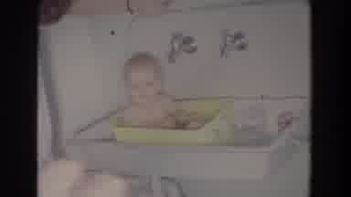 Fallston Maryland (1965): Baby Plays With Bathwater Inside Plastic Bin