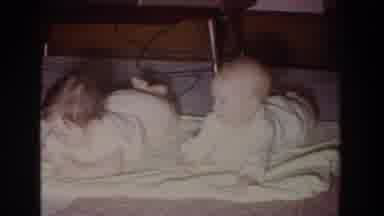Fallston Maryland (1965): Two Babies Lie On Their Stomachs Having Fun And Kicking