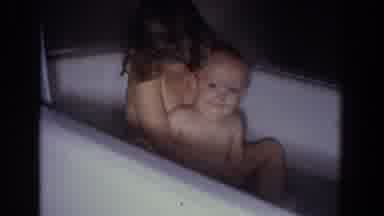 Fallston Maryland (1965): Girl Gives Toddler Kiss While Sitting In A White Bathtub