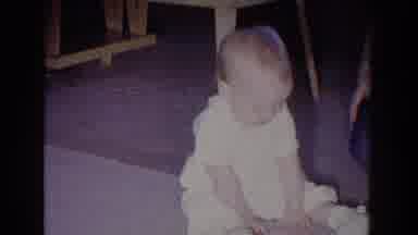 Fallston Maryland (1965): A Baby Enjoying Having The Knowledge Of Getting What