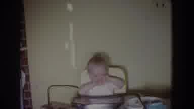 Fallston Maryland (1965): A Baby Is In A High Chair Laughing At Someone