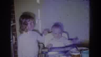 Fallston Maryland (1965): Girl Wearing Black Sweater Holds And Kisses Baby Wearing