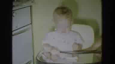 Fallston Maryland (1965): Baby In High Seat Laughs On Camera While Adult Teases