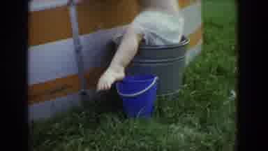 Fallston Maryland (1965): Toddler In Metal Bucket Steps Into A Second Smaller