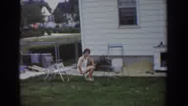 Fallston Maryland (1965): Girl Sitting Alone Outside And Woman Playing With Baby