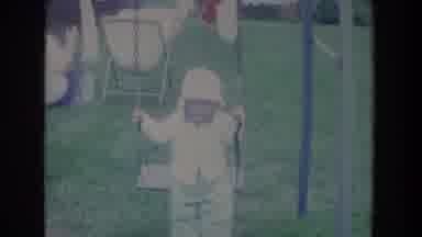 Fallston Maryland (1965): A Small Child Swings In The Yard While Two Older