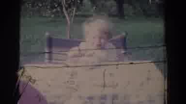 Fallston Maryland (1965): Girl Wearing Pink Dress Stands Next To Grey Car On A