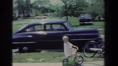 Fallston Maryland (1965): Small Girl On A Tricycle Riding On Sidewalk Past Other
