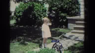 Fallston Maryland (1965): A Child Playing And Walking Near A Bicycle