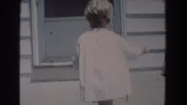Fallston Maryland (1965): Child Climbing Stairs Opening Door And Looking Back