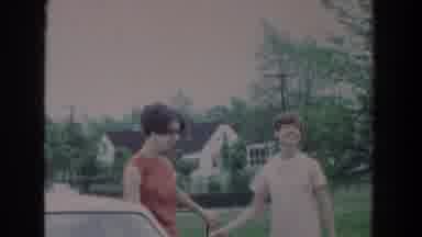 Fallston Maryland (1965): Three Girls Stand By Tan Car On A Cloudy Day