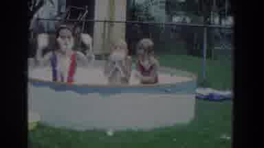 Fallston Maryland (1965): Three Children In Bathing Suits Playing In A Small Above