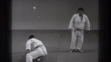 Tokyo Japan (1971): Two Men Wearing Martial Arts Do Guys Finish Demonstrating One