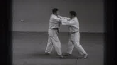 Tokyo Japan (1971): Two Men Slowly Practicing Martial Arts Moves
