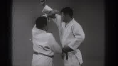 Tokyo Japan (1971): Two Men Demonstrating A Martial Arts Technique Of Flipping A