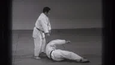 Tokyo Japan (1971): Two Men In A Karate Match As One Gets Up After Being Held On